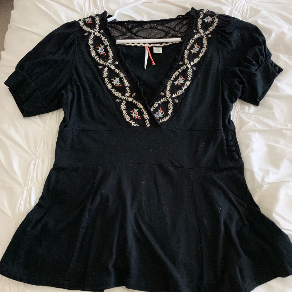 Anthropologie blouse with embroidery.